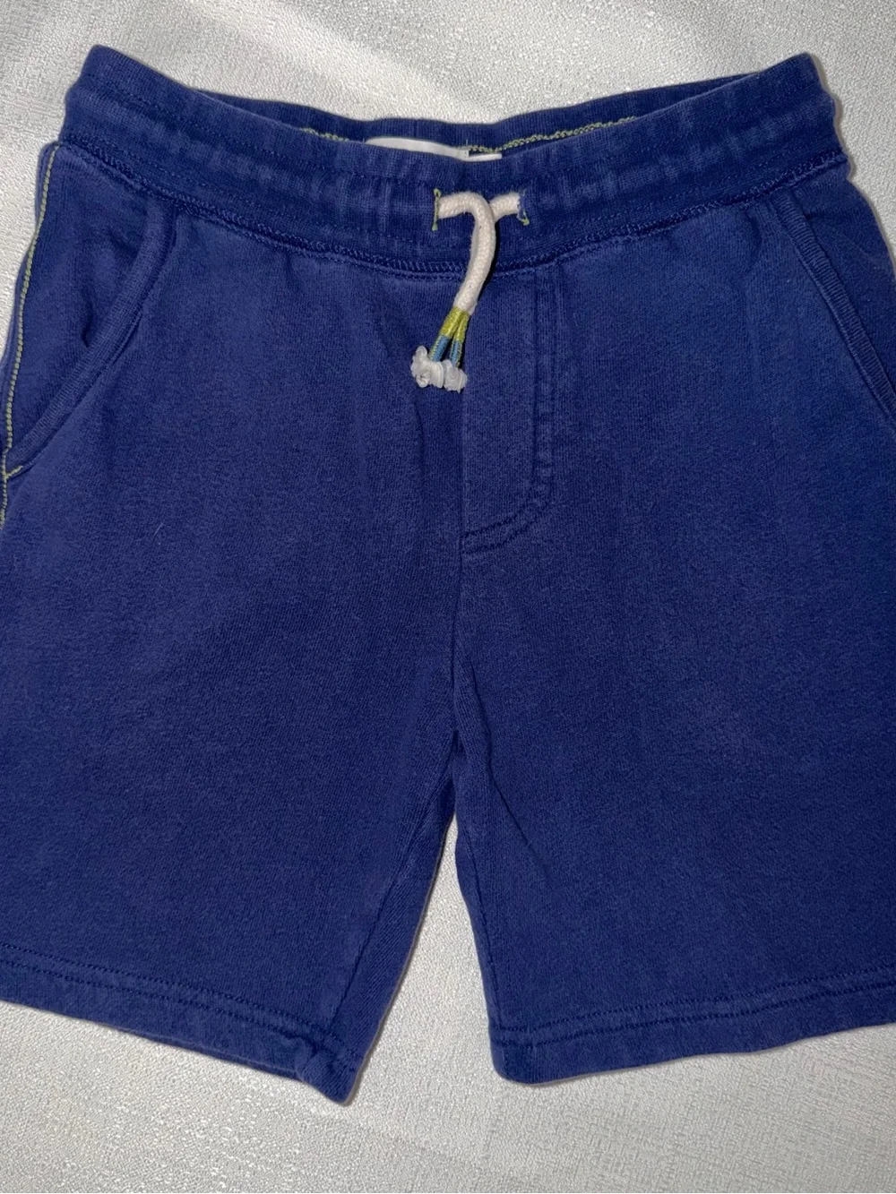 Two Mini Boden appliqué T-shirts, and two pair of shorts size 5/6